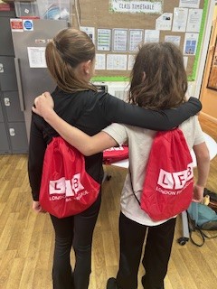 Paul Jennings and Sherlock the Fire Dog provide an interactive session at TLC, sparking interest in Fire Cadets and civic service.