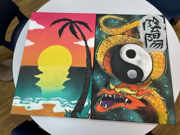 Bold and vibrant artwork created by TLC learners as part of a street art project with professional artist James from Aero Arts.