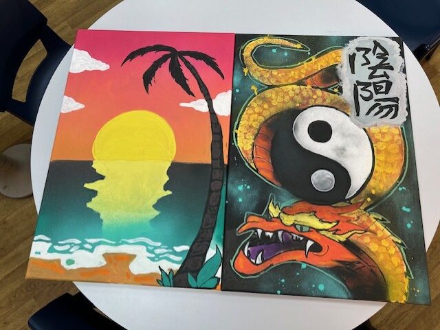 Bold and vibrant artwork created by TLC learners as part of a street art project with professional artist James from Aero Arts.
